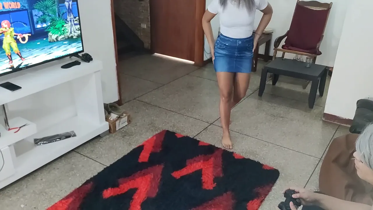 Latina stepdaughter sits on her stepfather's cock while playing video games
