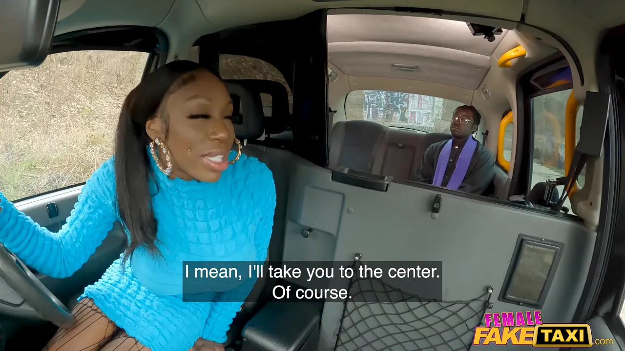 Ebony porn star Ebony Mystique rides a priest's big dick in the back of her taxi