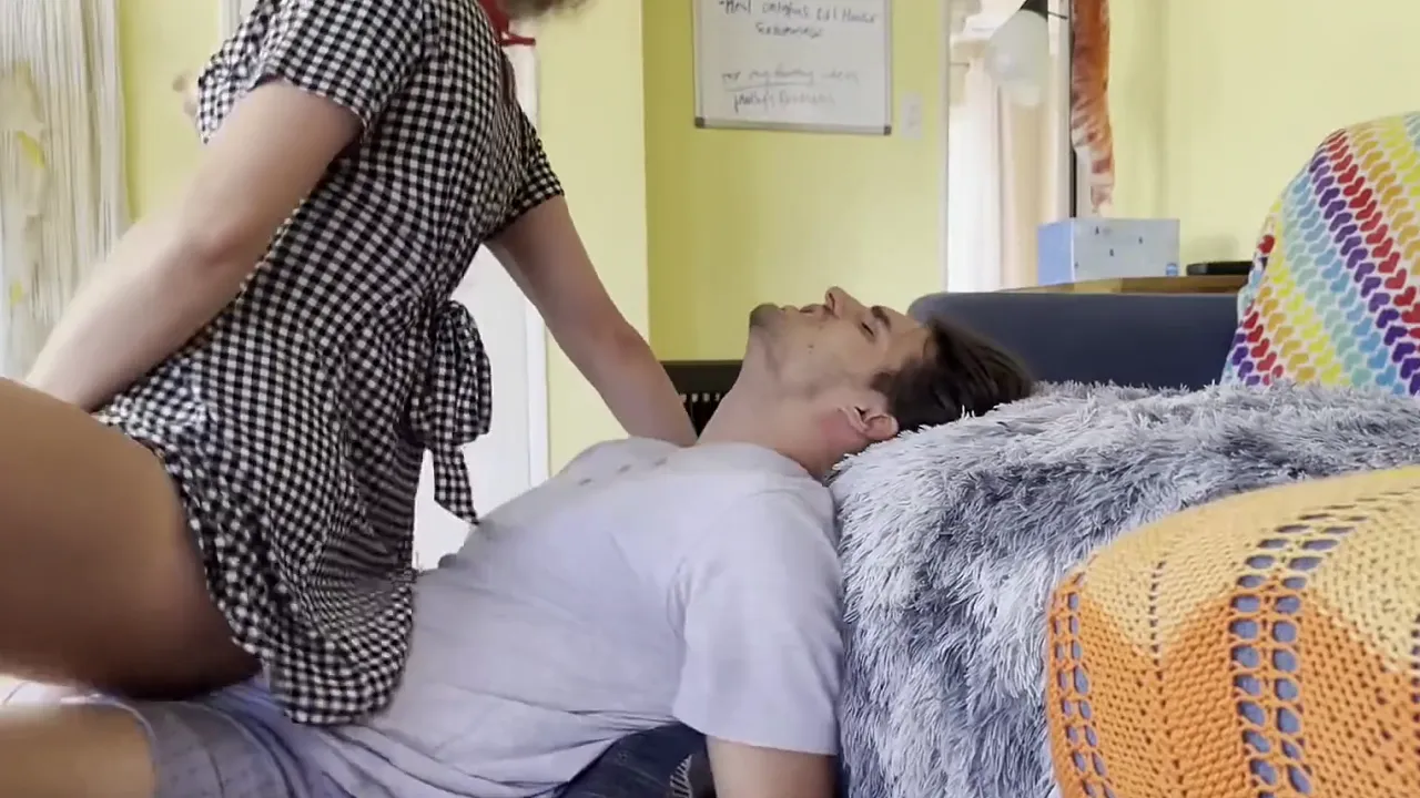 Curly-haired babysitter seduces employer and rides his cock in the living room