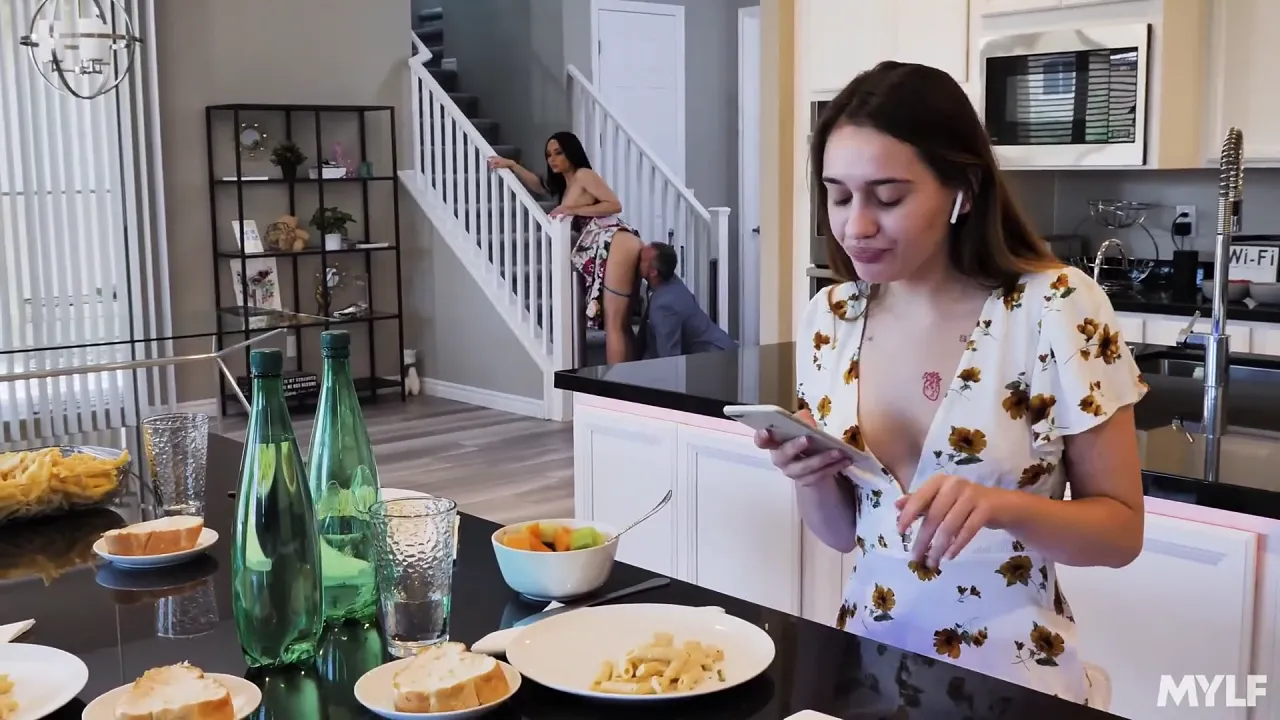 Guy drills babe's hot MILF mom in the kitchen while she cooks dinner