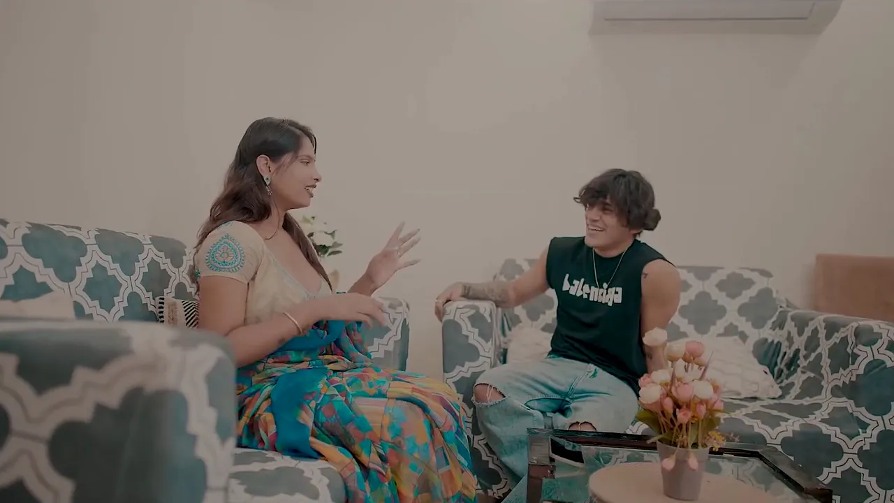 Indian MILF with huge tits rides a young cock hard