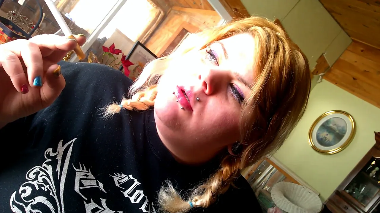 Exclusive video of a double-braided blonde BBW smoking