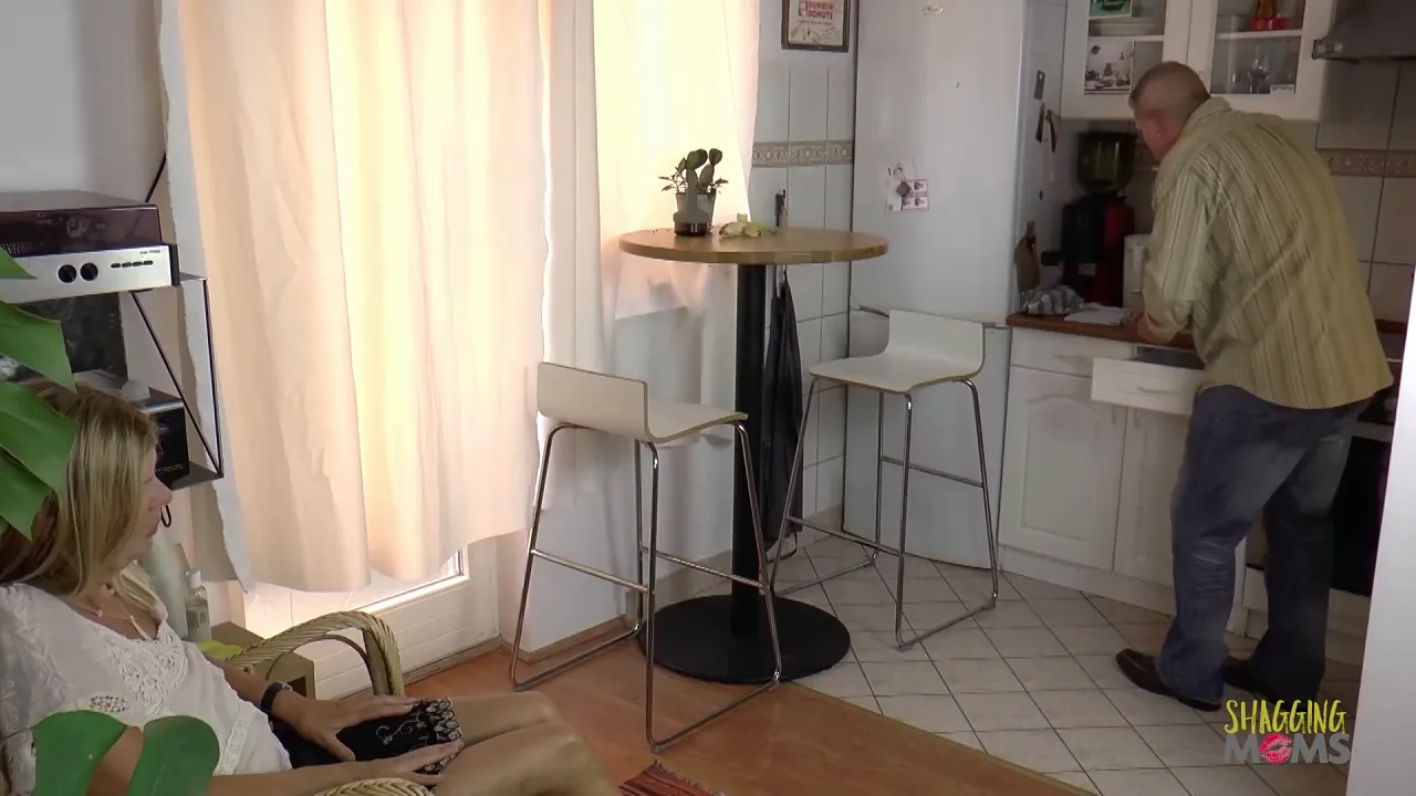 Granny milf was just sitting in her rocking chair and using a banana sex toy