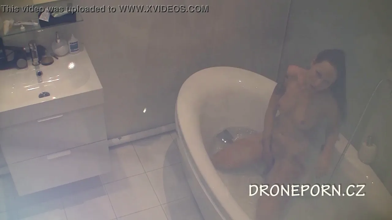 Scarlett Black masturbates naked in the bath