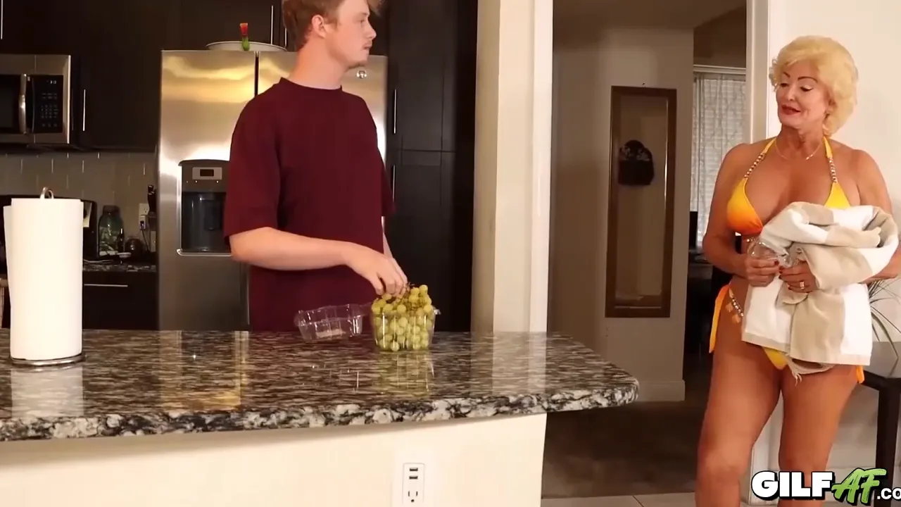 Mature neighbor seduces young man and gets fucked in his house