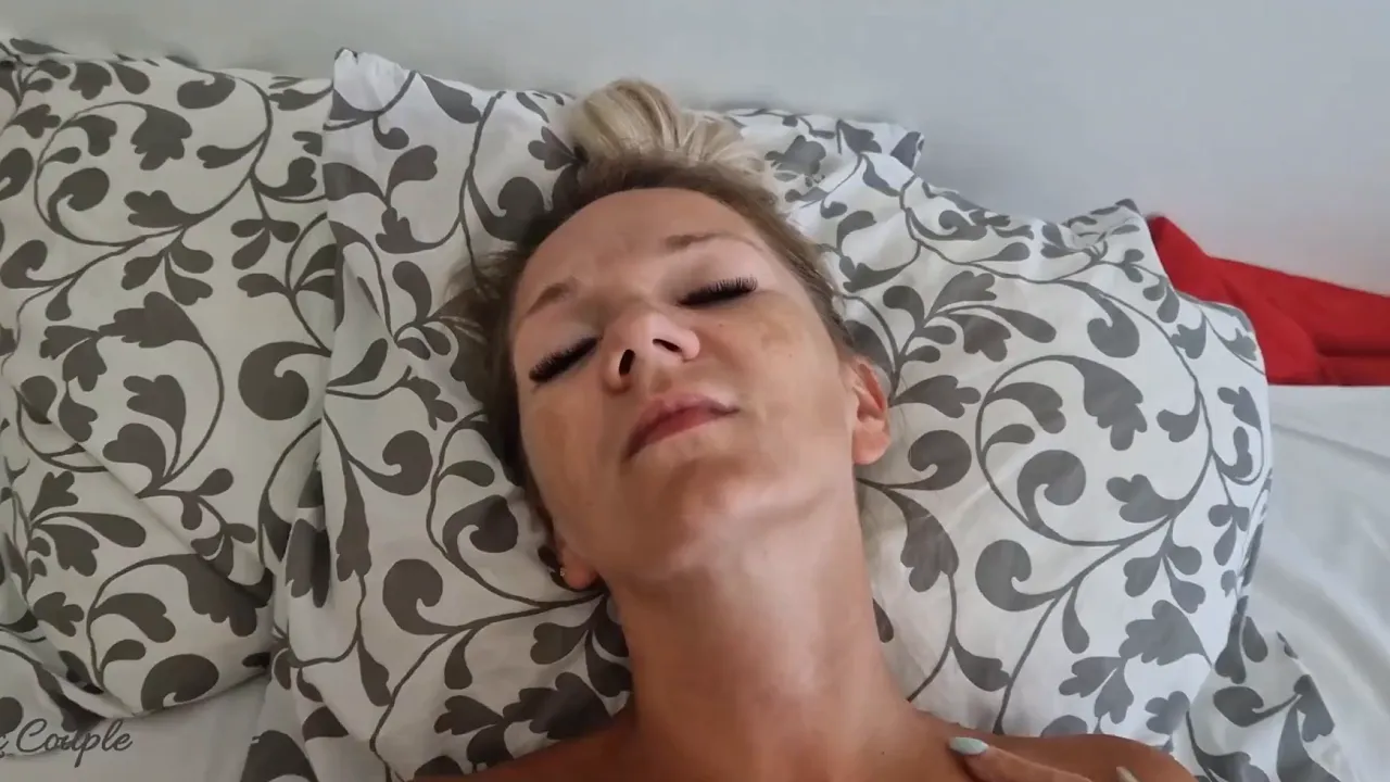Mature amateur wife rubs her clit with a vibrator while fucking her husband in missionary