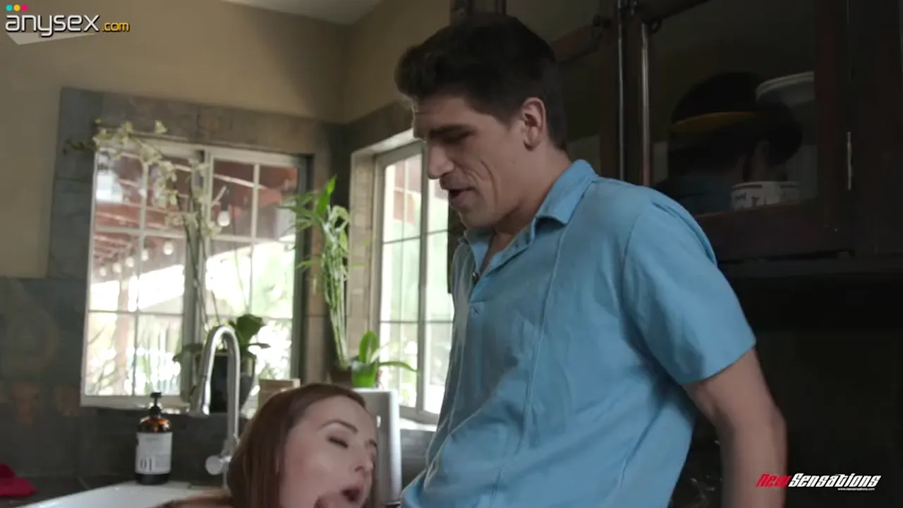 Ginger Danni Rivers sucks and rides a big cock in her fellow's kitchen