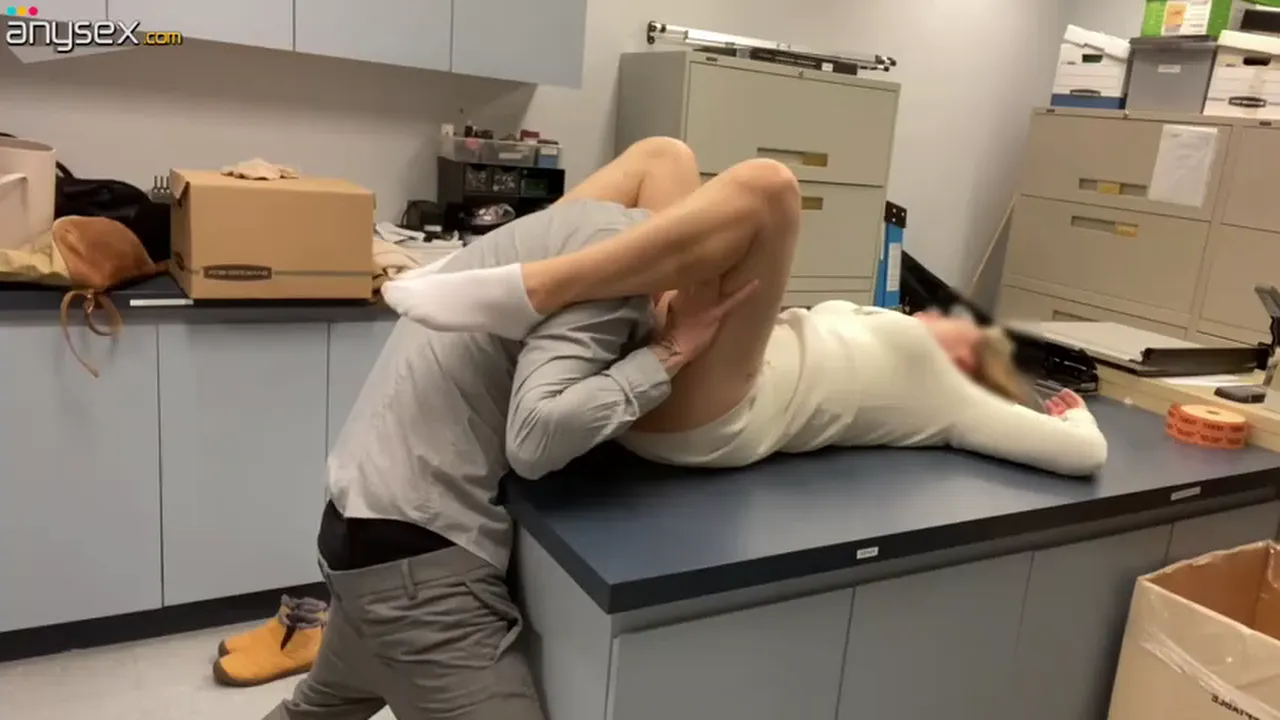 Brunette MILF gets an unexpected fuck in the office storage room