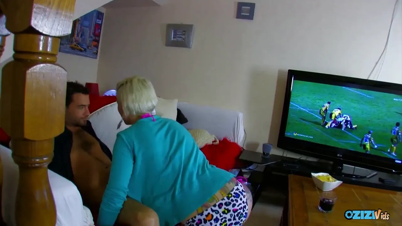 Blonde MILF with back tattoo rides him anally in cowgirl position
