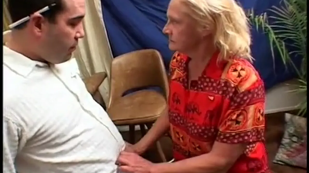 Older grandma strips and touches herself