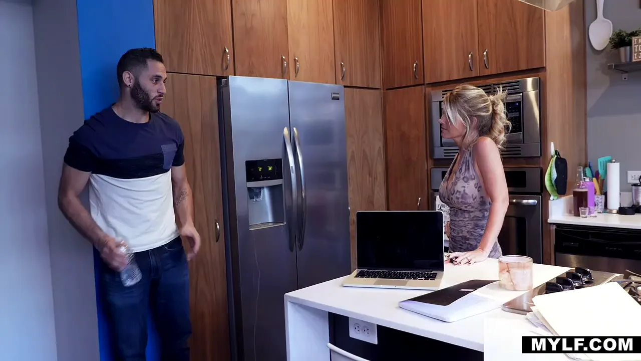 Blonde MILF stepmom teaches her son about sex on the kitchen table