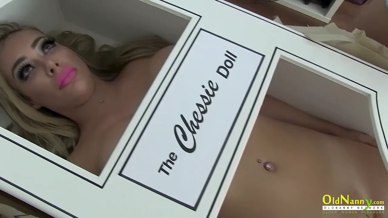 Mature blonde plays with her big-titted sex doll in a romantic lesbian scene