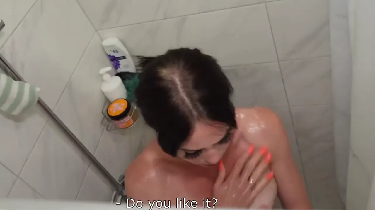 Busty stepmom sucks her stepson's big cock in the shower before he creampies her