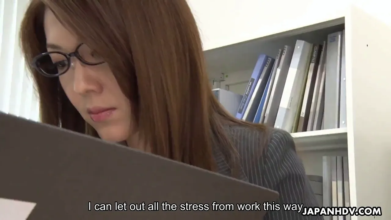 Asian brunette in lingerie fingers herself on the office desk