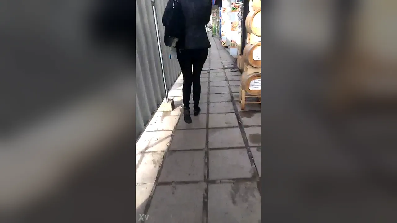 MILF walks showing off her tight pants