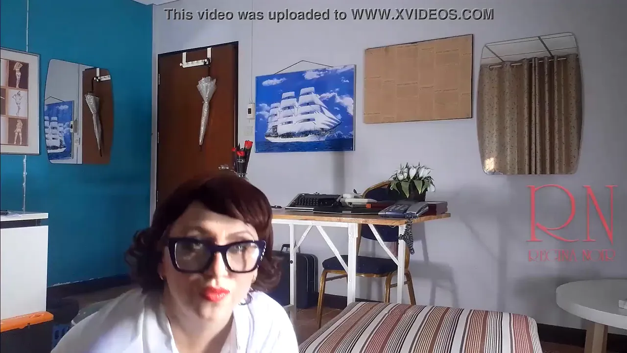 Naked secretary Goddess Regina puts on stockings, nylon and lingerie for office domination