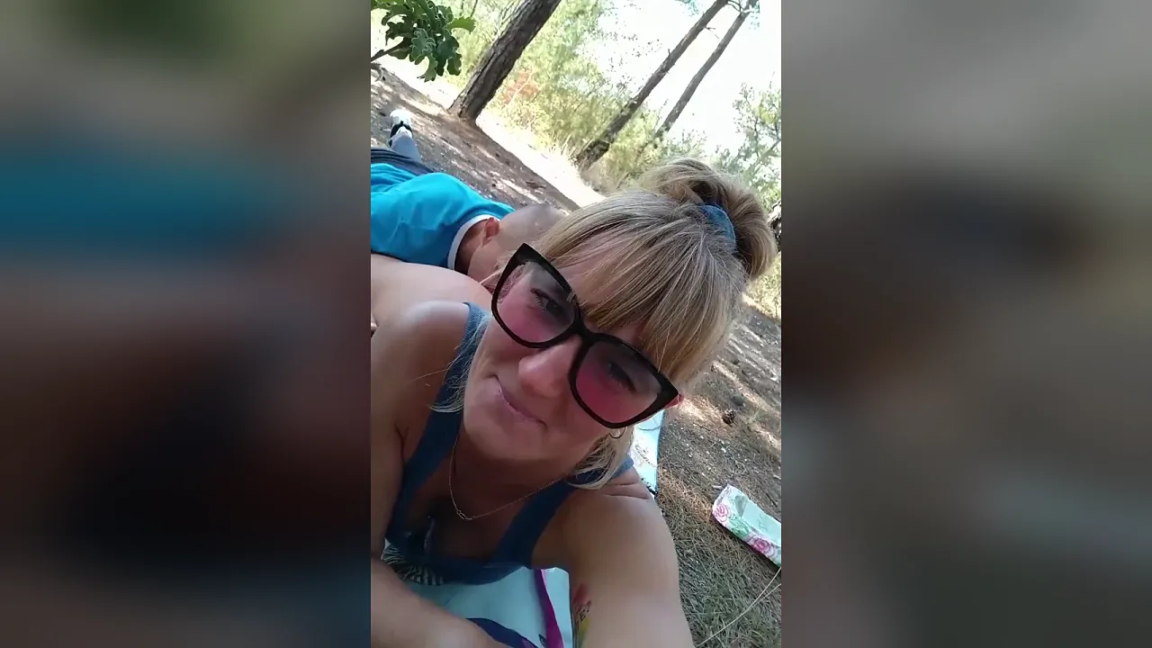 MILF in glasses records herself while her husband eats out her soaking wet pussy outdoors